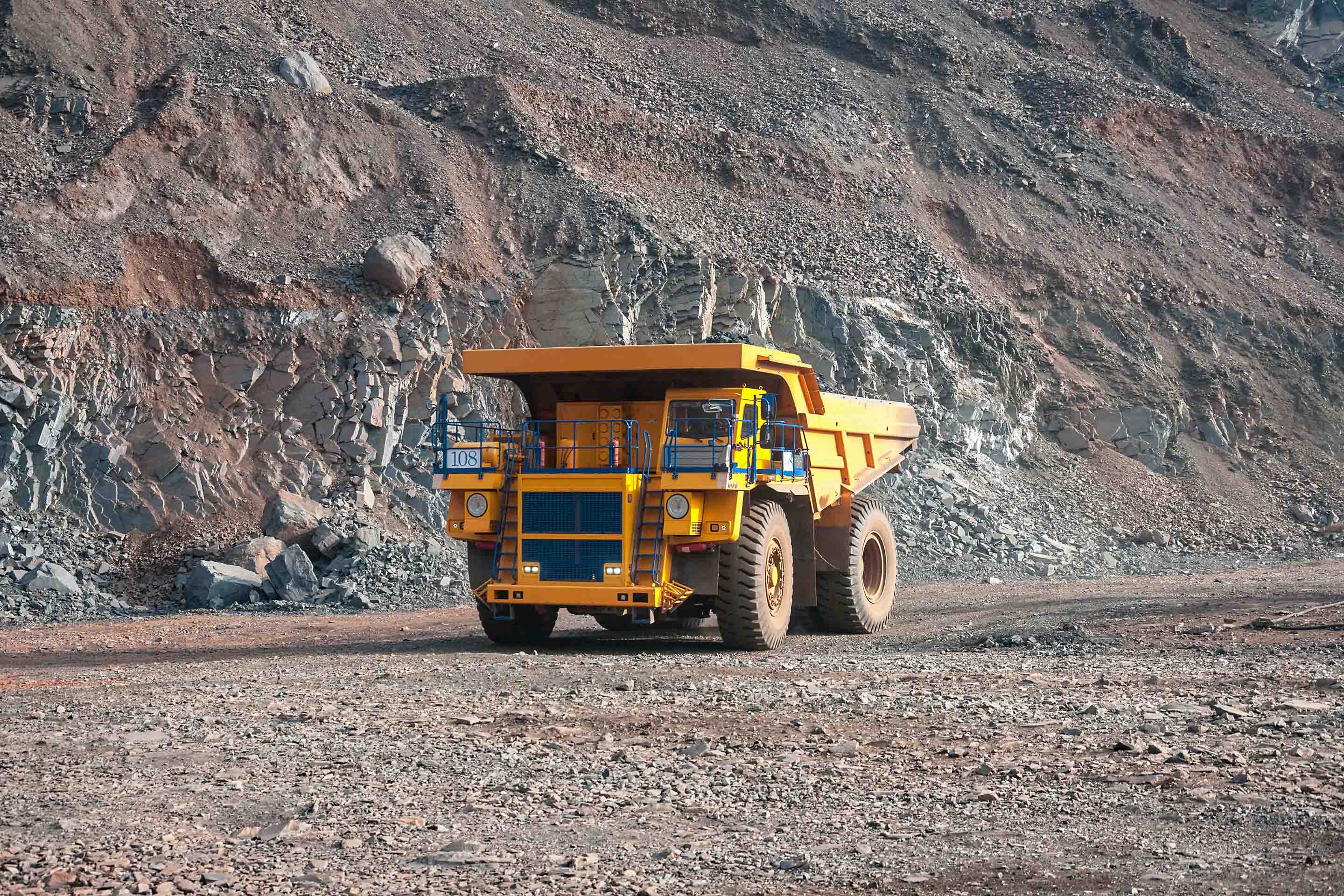 An image of a mining truck in a quarry