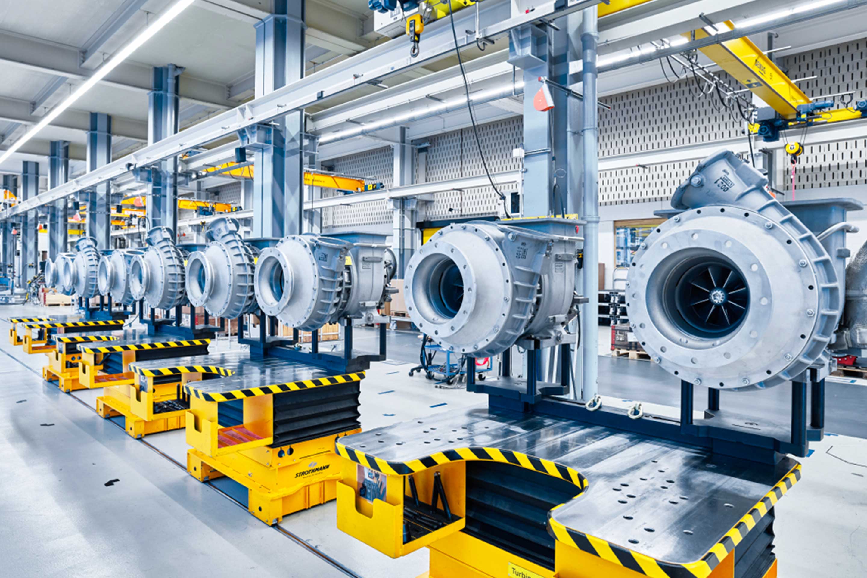 An image of a row of Accelleron turbochargers to highlight how turbocharging can help decarbonization