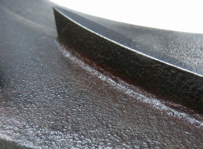 Air diffuser after cleaning - close-up view of individual vane/high surface roughness 