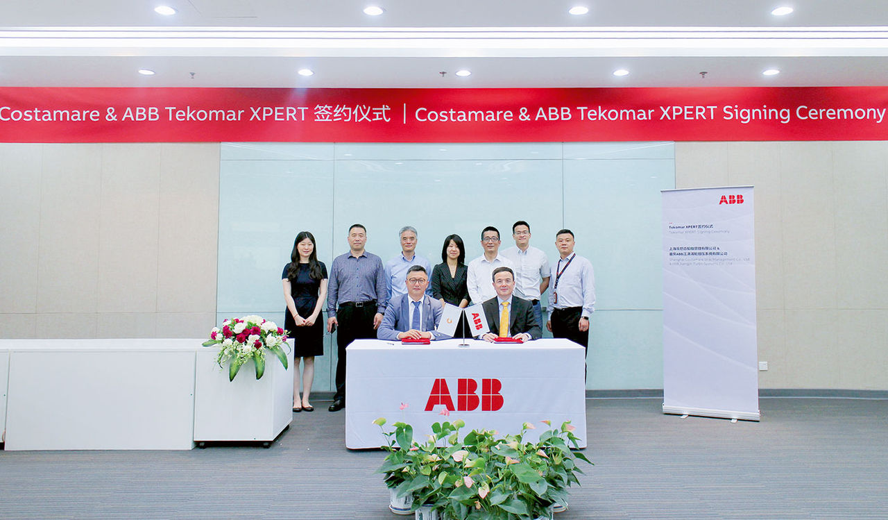 Seated, from left: Xiaodong Shen, General Manager of Shanghai Costamare Ship Management Co., Ltd and Allan-QingZhou Wang, Head of ABB Turbocharging China, signed the agreement on using Tekomar XPERT