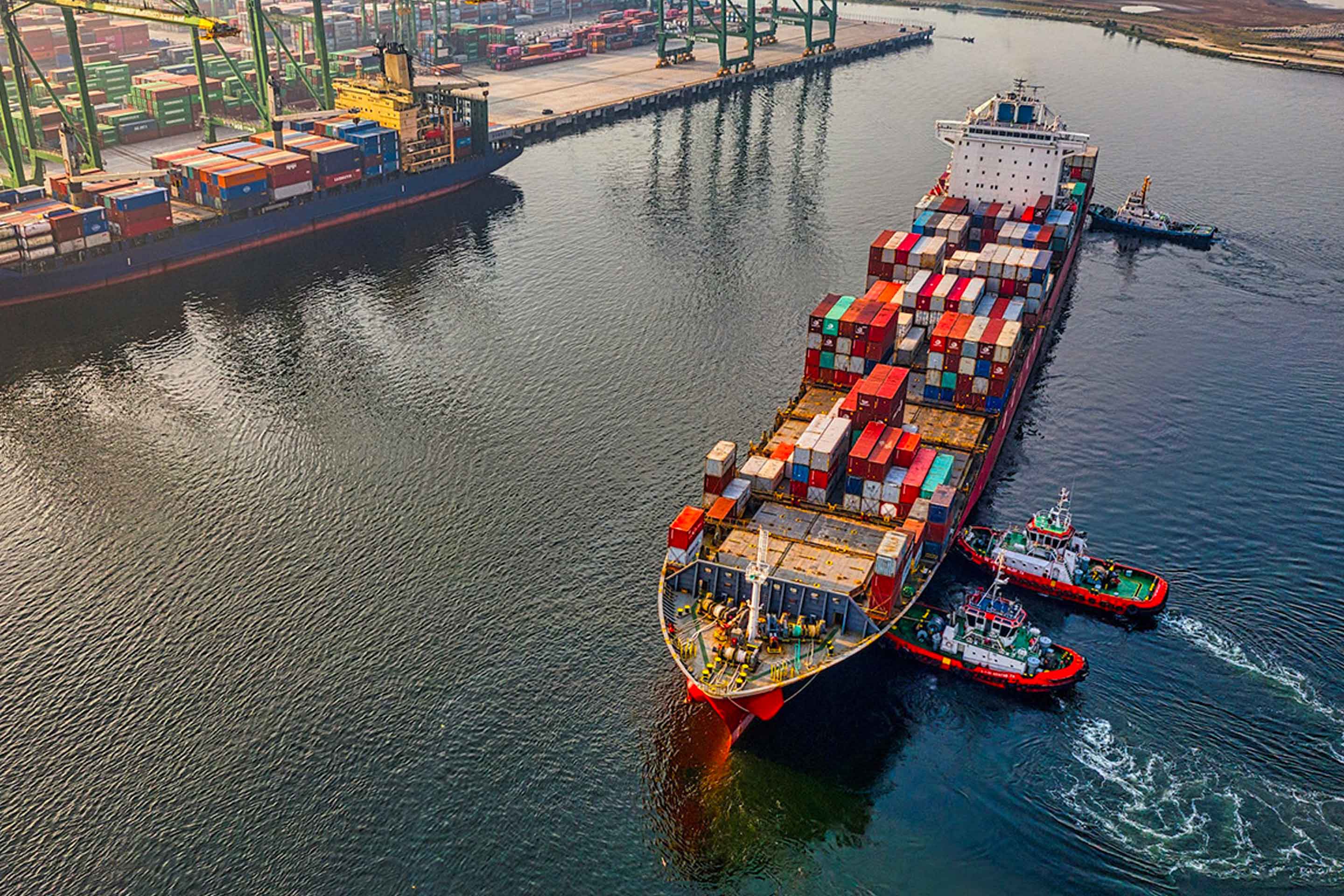 An image of ships in a dock to highlight decarbonization in the maritime industry