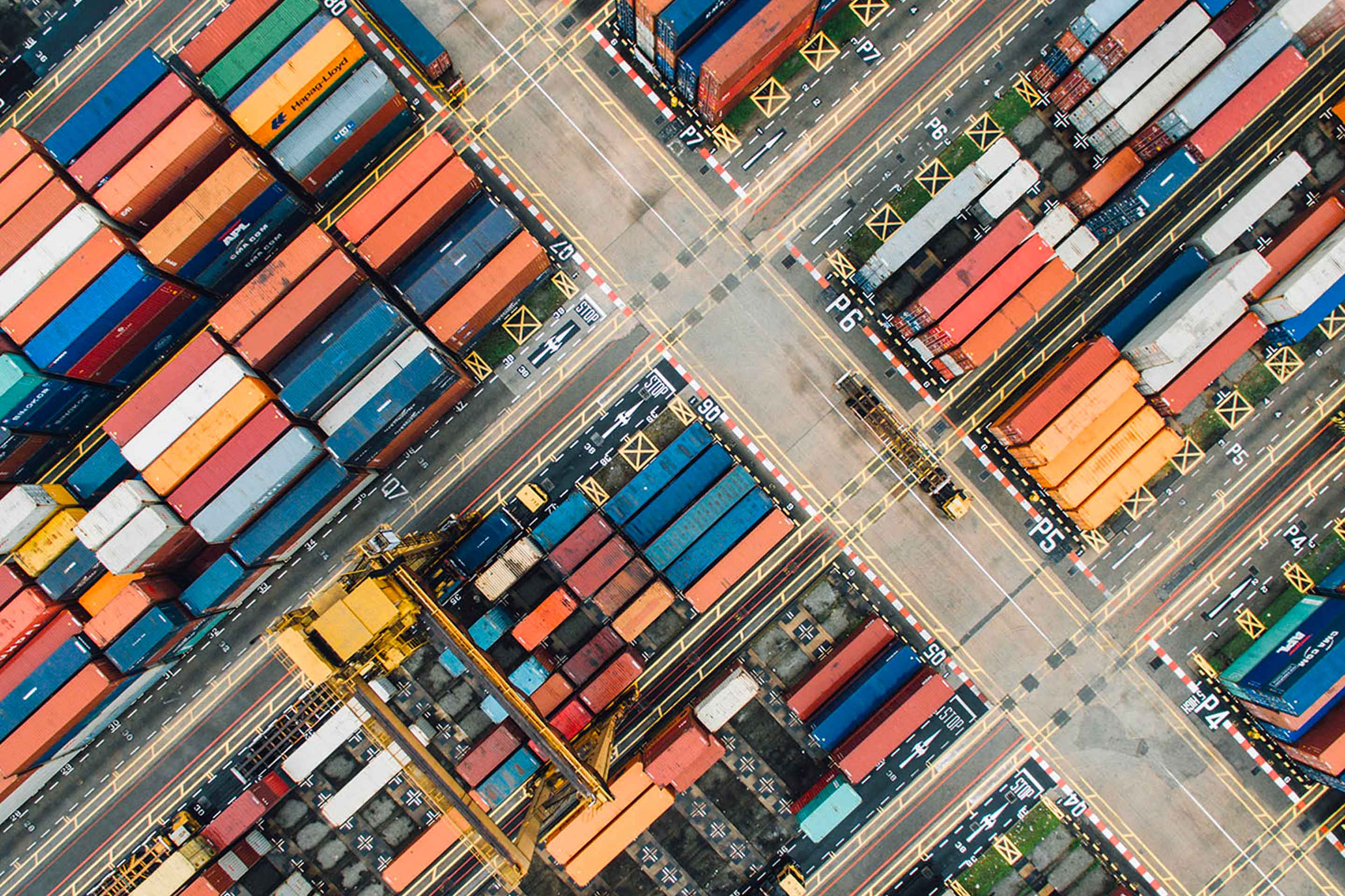 An aerial view of containers in a yard