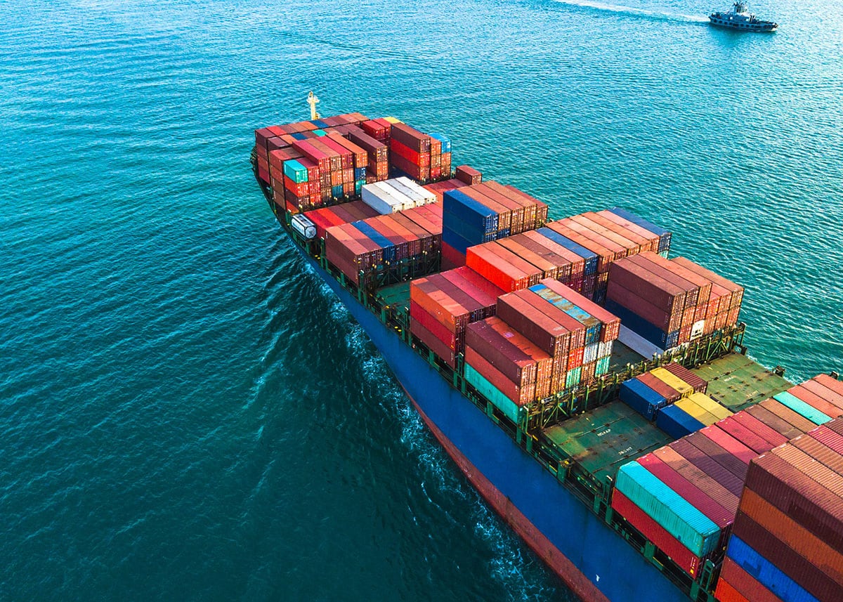 an image of a container ship to highlight implementation of e-fuels in shipping